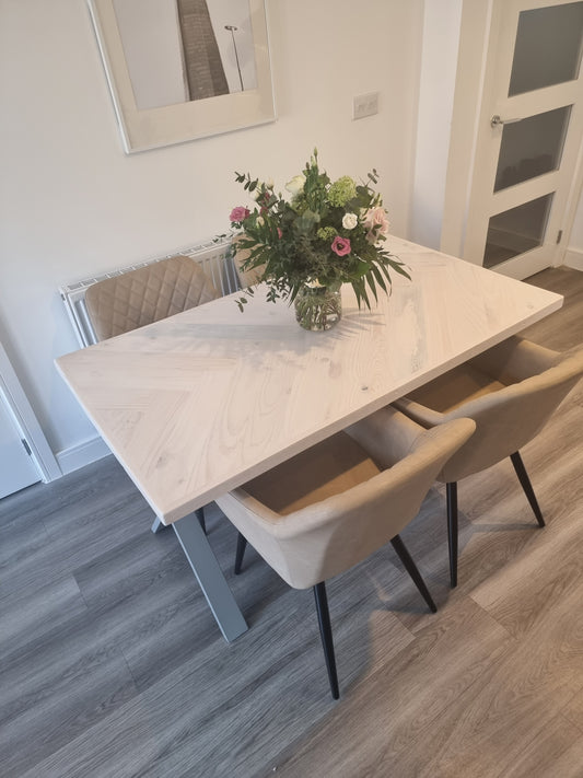 White wash dining table with grey metal legs