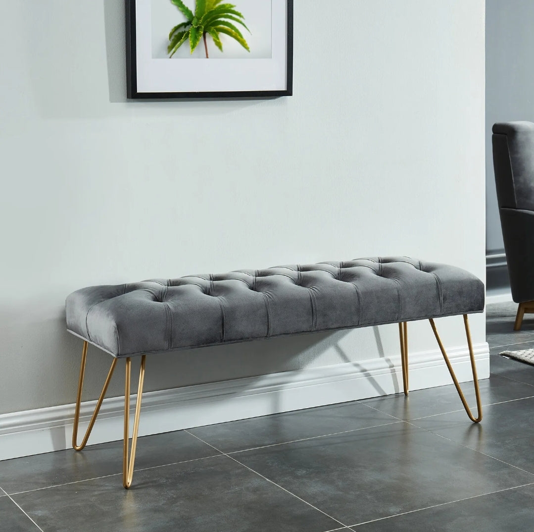 Upholstered bench with gold hairpin legs