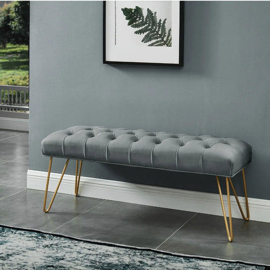 Upholstered bench with gold hairpin legs