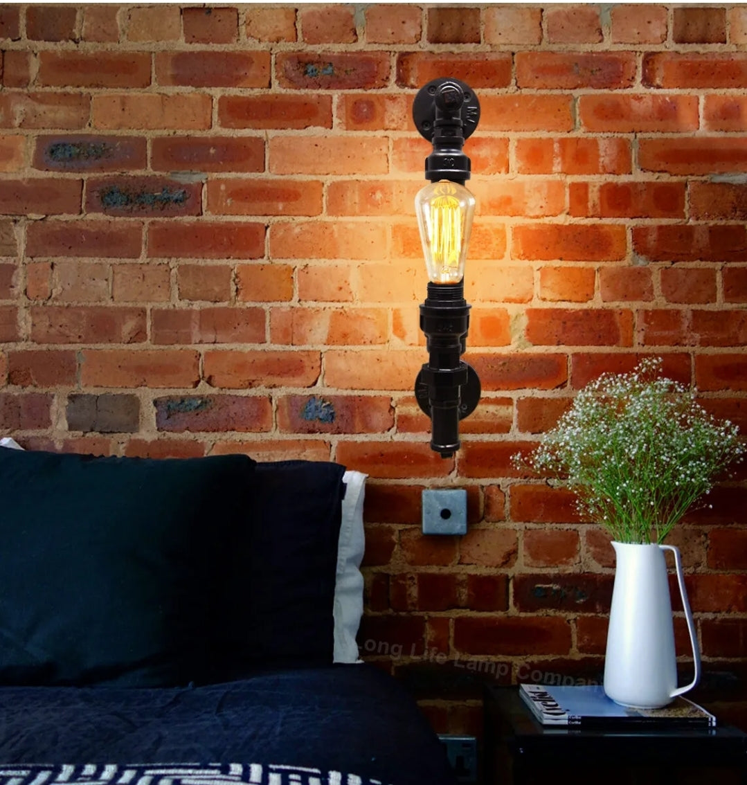 Rustic steampunk wall light