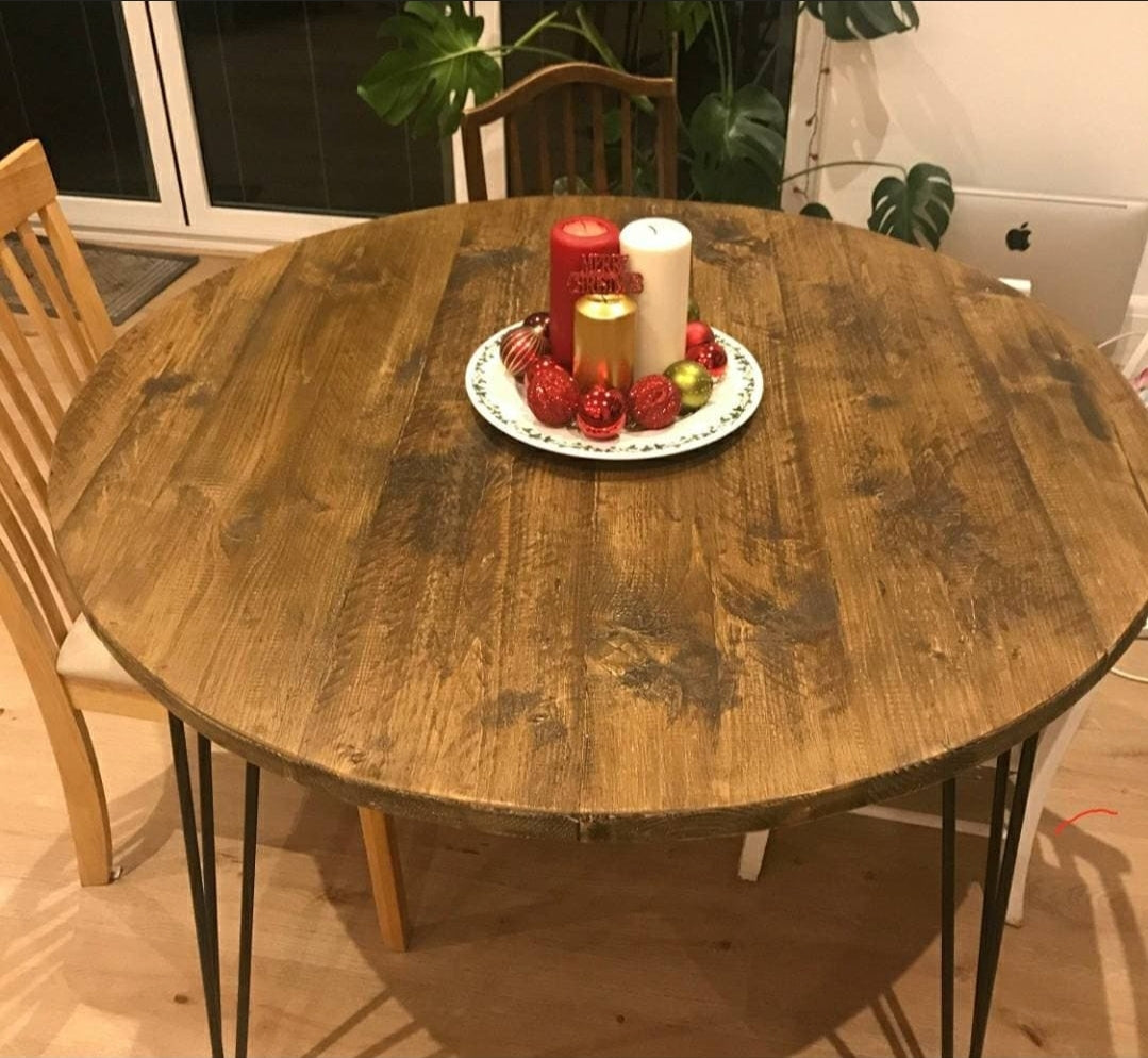 Reclaimed scaffold boards round dining table