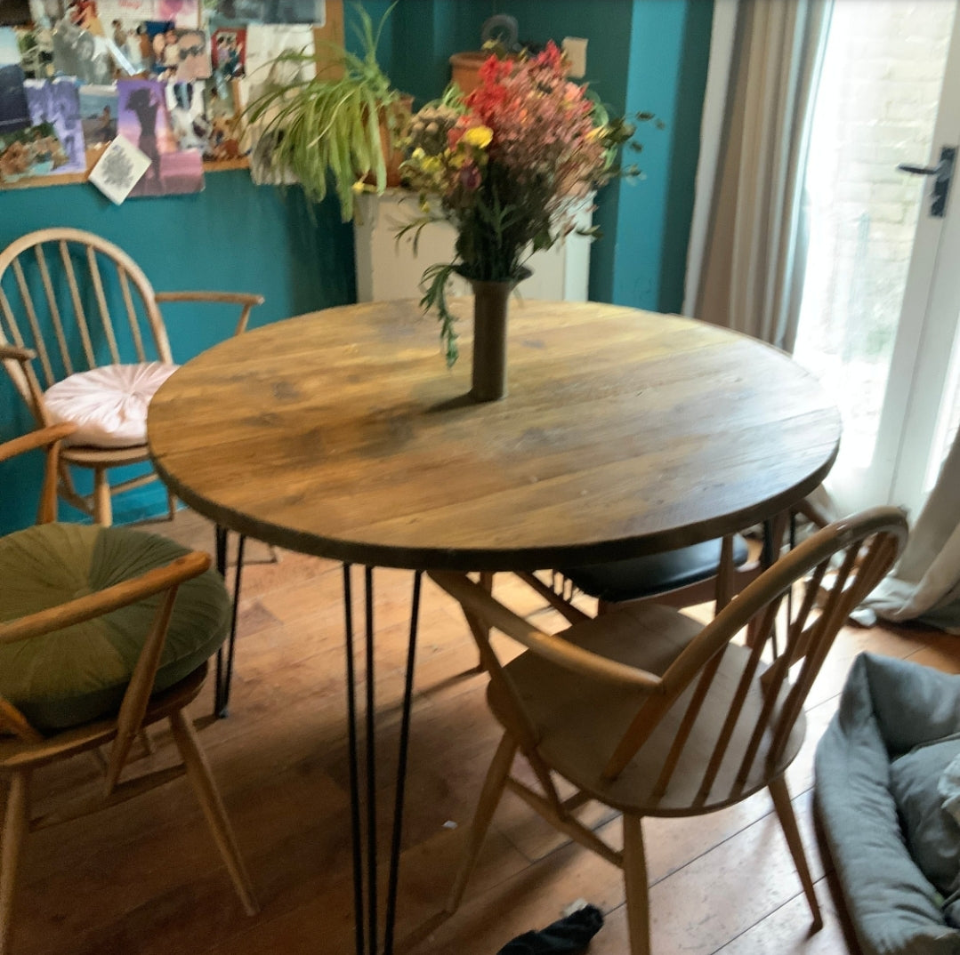 Reclaimed scaffold boards round dining table
